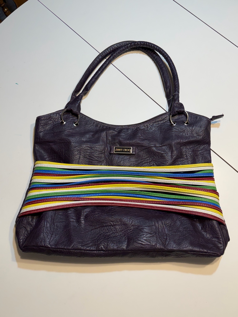 purple faux-leather shoulder bag colorful stripes decorative "Jimmy Choo" label